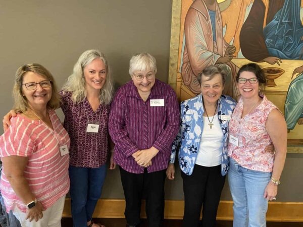 (Left to right) Tania (founding member of ECF), Kami (Benedictine CARE and ECF Facilitator), Sr. Karen and Sr. Paula (OSB, St. Paul's Monastery), and Colleen (founding member of ECF) at the Monastery's 2024 Summer Cookout in July